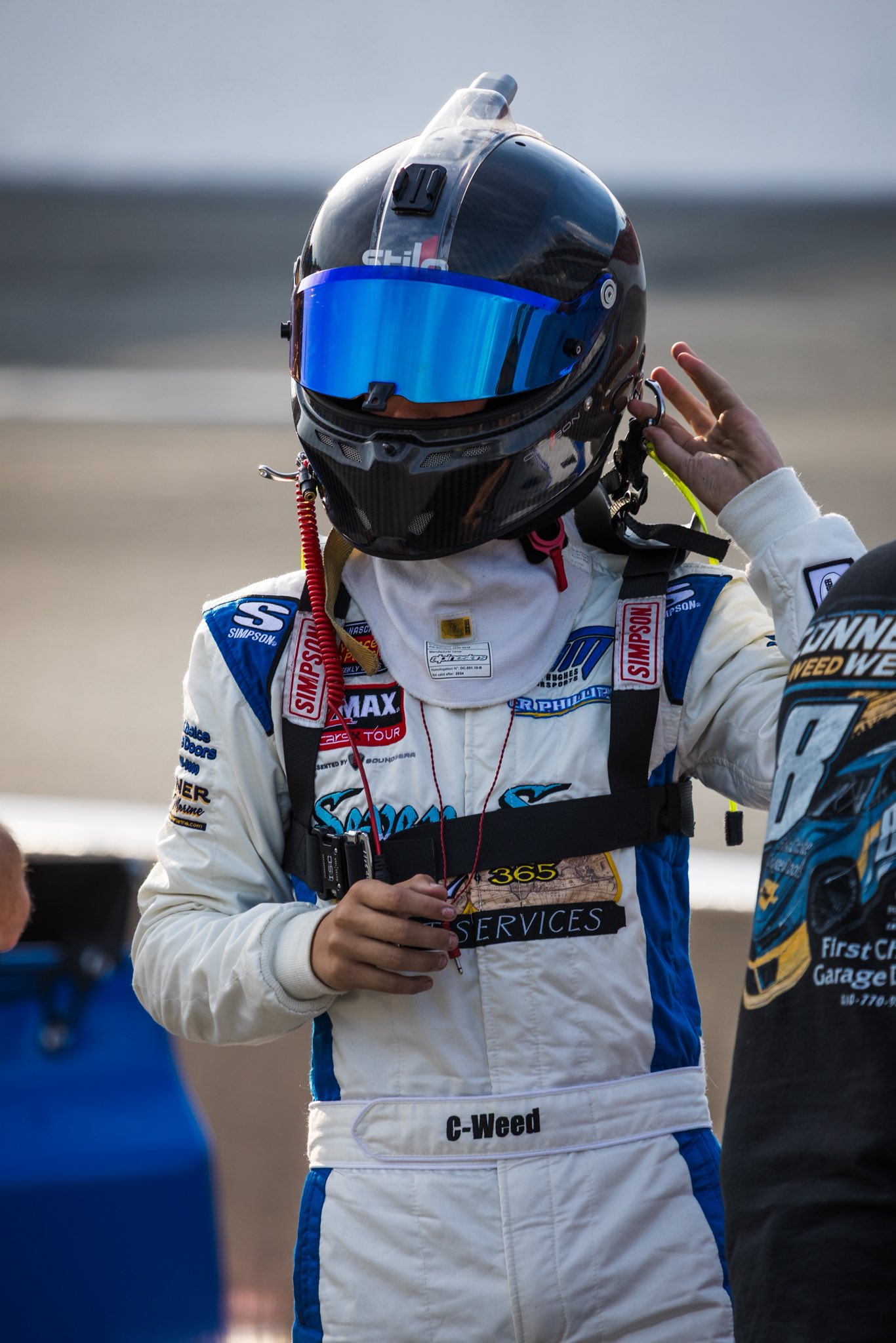 Conner in his C-Weed firesuit and helmet